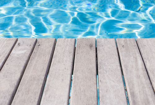 Why You Should NOT DIY Your Pool Deck Cleaning